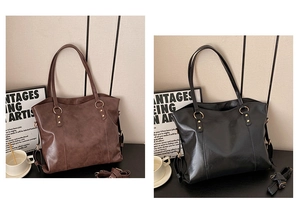 Detailed view of large tote bags in brown and black with gold ring hardware and leather texture