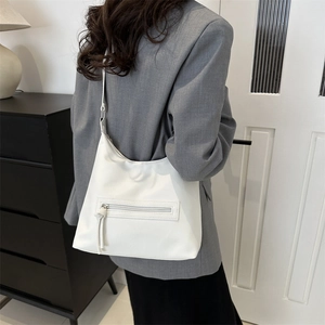 Minimalist white tote bag in lychee texture leather for women, perfect for daily commute