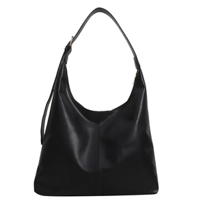 Minimalist black large capacity hobo bucket bag with adjustable strap in 2024 winter style