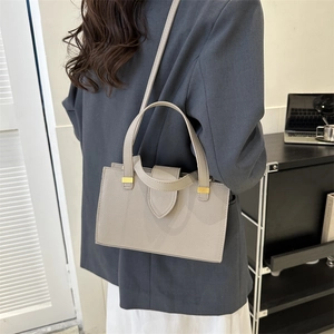 Chic taupe pebbled leather handbag with gold hardware for women summer fashion