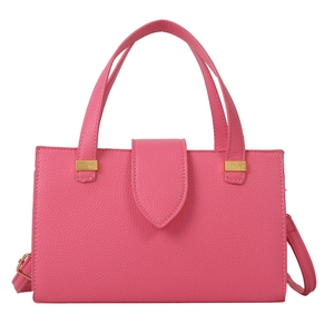 Modern fuchsia leather tote bag with lychee texture and adjustable shoulder strap