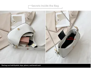 Internal structure of white crescent bag showing zip pocket for phone and keys