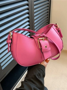 Chic pink shoulder bag with gold buckle and smooth faux leather for stylish women