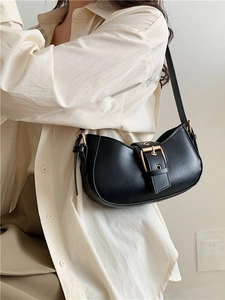 Elegant black crescent hobo shoulder bag with golden horsebit buckle for women