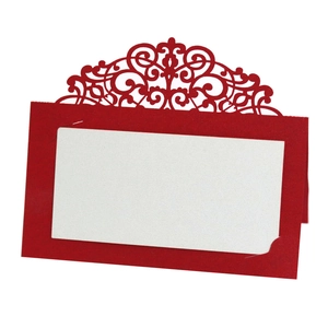 Elegant red and white laser-cut lace place cards for wedding seating and table decorations