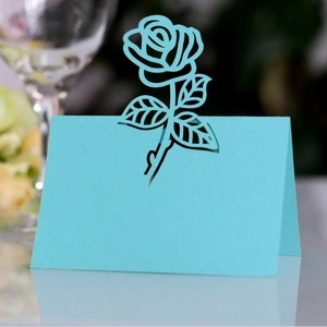Tiffany blue laser-cut tent place card featuring a hollow rose design for wedding tables
