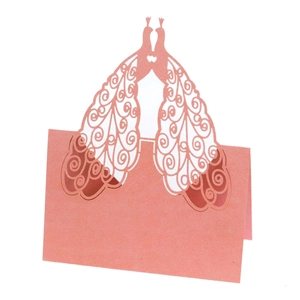 Pink peacock laser cut place card with intricate镂空 design for wedding seating