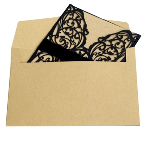 Elegant black laser cut invitation set with kraft envelope and silk ribbon for weddings