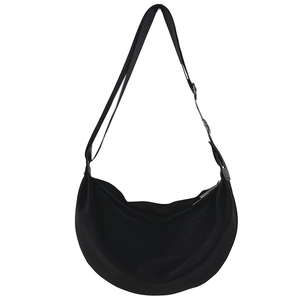 Minimalist black crescent shoulder bag with adjustable wide strap for daily commute