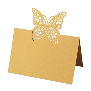 Laser-cut 3D butterfly place cards made of kraft paper for wedding table decorations