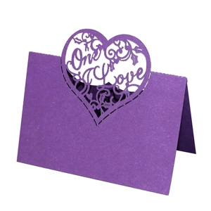 Purple laser-cut heart place card with One Love text on shimmering pearl paper