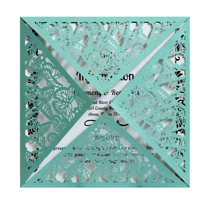 Laser cut butterfly hollow square invitation kit in pearlized mint green with white card
