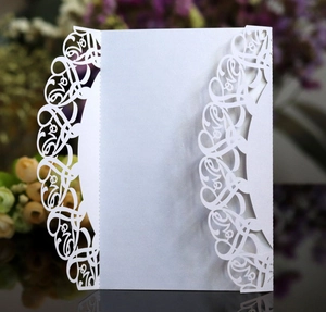 Elegant white laser-cut 'LOVE' greeting card made of shimmering pearlescent paper