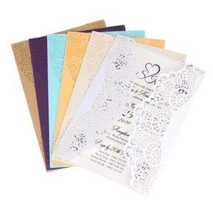 Detail of laser-cut floral patterns and various color options for elegant wedding invitations