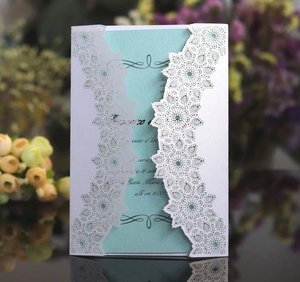 Elegant laser-cut hollow lace wedding invitation with a light blue inner pearl paper card