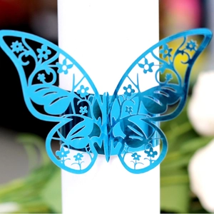 Hollow laser cut blue butterfly napkin ring with floral patterns for festive table decor