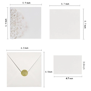 Laser cut white floral wedding invitation set with envelopes and RSVP cards