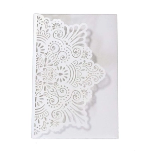 Elegant white laser-cut wedding invitation with intricate mandala floral hollow design
