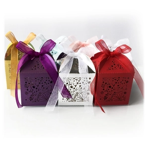 Laser-cut star hollow gift boxes with silk bows in multiple pastel colors