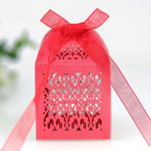 Red laser cut hollow gift candy box with floral patterns and matching organza ribbon bow