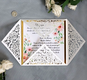 Elegant laser-cut wedding invitation with white rose lace cover and pink floral inner card