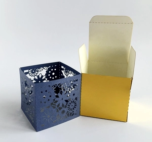 Laser cut hollow blue gift box with yellow inner drawer and floral patterns