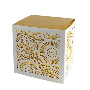 Elegant laser-cut square gift box with intricate golden floral patterns for weddings