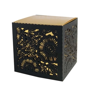 Laser-cut floral hollow gift box with elegant matte black exterior and gold interior