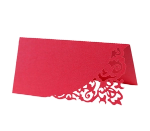 Elegant red laser-cut wedding place cards with intricate hollow European floral patterns