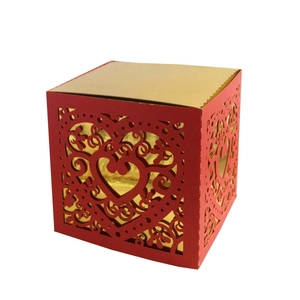 Elegant red laser-cut wedding candy gift box with gold interior and heart patterns