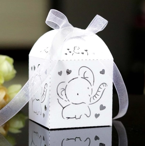 White laser-cut candy gift box featuring elephant design and organza ribbon bow