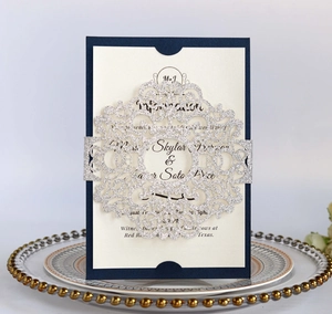 Detailed laser-cut silver glitter belly band with intricate mandala patterns for invitations