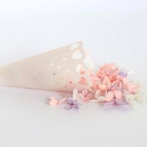 Hollow heart pattern paper confetti cones with pink and purple dried petals for wedding