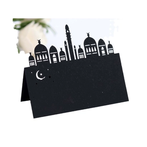 Laser cut black Ramadan place cards with mosque silhouette and moon pattern for weddings