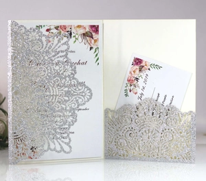 Silver glitter laser-cut wedding invitation set with floral inner cards and mandala patterns