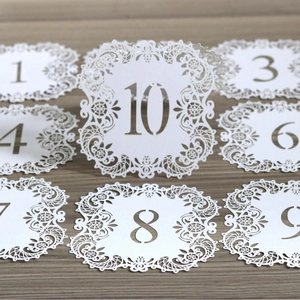 Laser cut wedding table numbers 1-20 with white lace hollow design on wood background