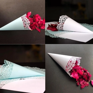 Laser-cut white lace paper flower cones for wedding confetti with dried rose petals
