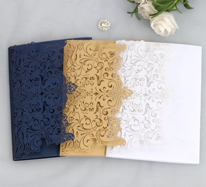 Detailed laser cut floral lace hollow invitation covers in navy, gold and white colors