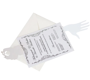 Detail of laser cut white wedding invitation set with elegant black border and script text