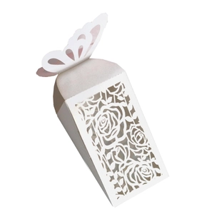 Elegant white laser-cut wedding favor box with hollow rose patterns and butterfly top