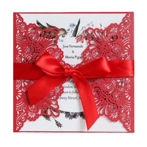 Elegant red laser cut lace wedding invitation with white floral card and satin ribbon