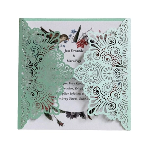 European laser cut lace wedding invitation in mint green with elegant floral inner card