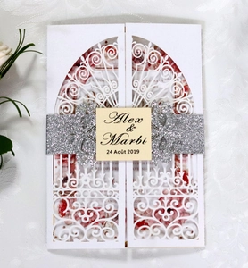 Laser-cut wedding invitation with silver glitter belly band and floral insert