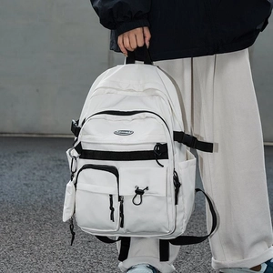 Minimalist white multi-pocket utility backpack for students with durable nylon fabric