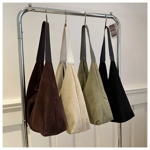 Selection of retro suede tote bags in dark coffee, cream white, grey green and black colors