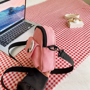 Mini sac bandoulière rose en toile avec badge lapin mignon et sangle réglable