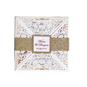 Elegant laser-cut square wedding invitation card with gold glitter band and custom tag