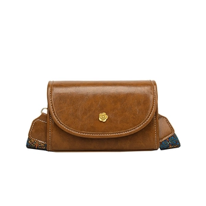 Retro brown leather crossbody bag with floral gold clasp and patterned wide strap