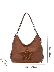 Detail of a brown matte suede tote bag with star embroidery and dimension measurements