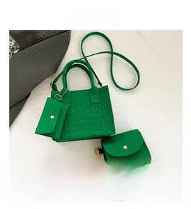 Three-piece vibrant green felt tote set with faux crocodile texture and matching pouches